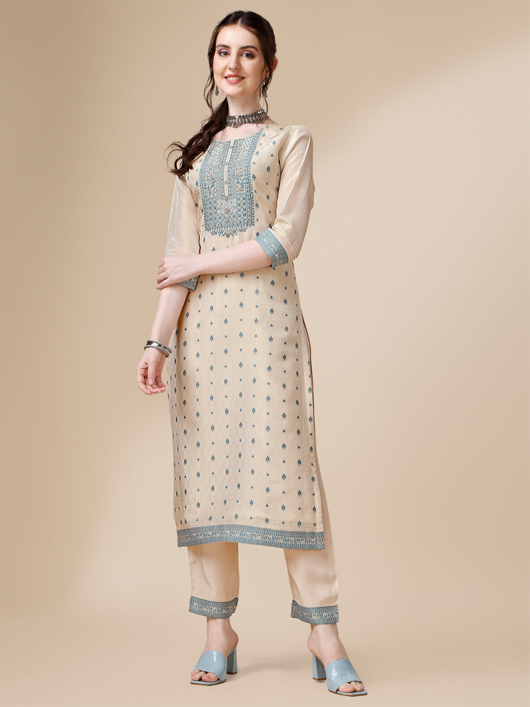 Cream Tissue Silk Kurta .Paired with Santoon Trouser and Chinon Dupatta