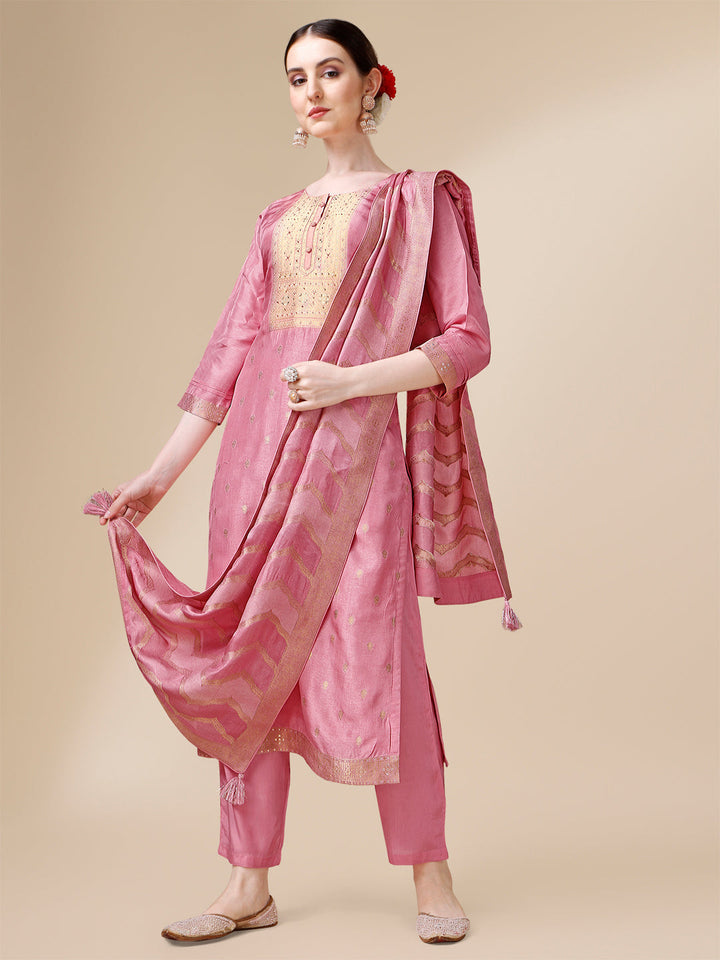 Creamy Pink Viscose Dola Silk Jacquard Kurta . Paired with Santoon Trouser and Viscose Dola Jacquard Dupatta