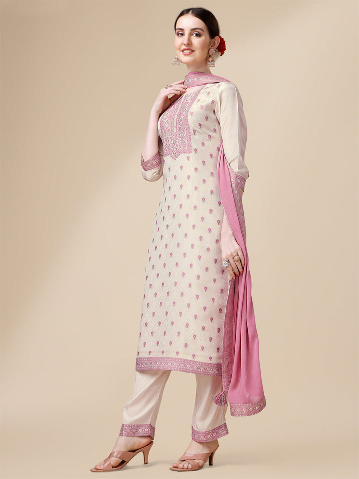 Cream Tissue Silk Kurta . Paired with Santoon Trouser and Chinon Dupatta