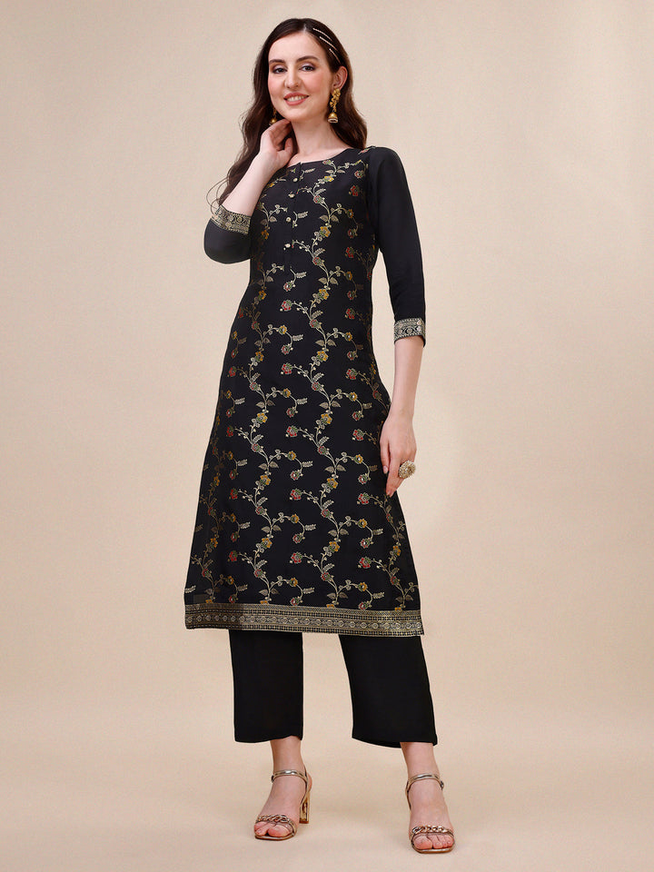 Black Dola Silk Jacquard Kurta . Paired with Santoon Trouser and Chinon Dupatta