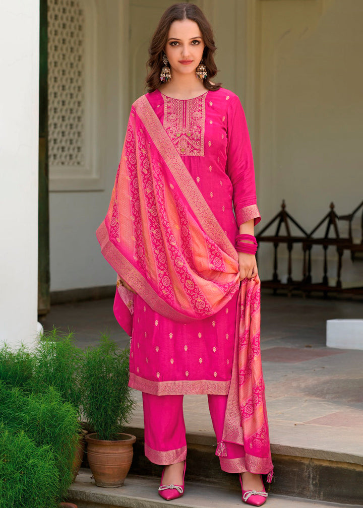 Rani Pink Dola Silk Jacquard Kurta .Paired with Santoon Trouser and Dola Silk Printed Dupatta