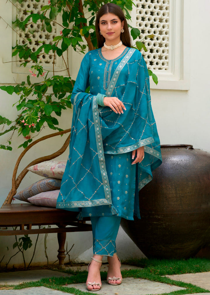 Ocean Blue Viscose Dola Silk Jacquard Kurta. Paired with Santoon Trouser and Organza Dupatta