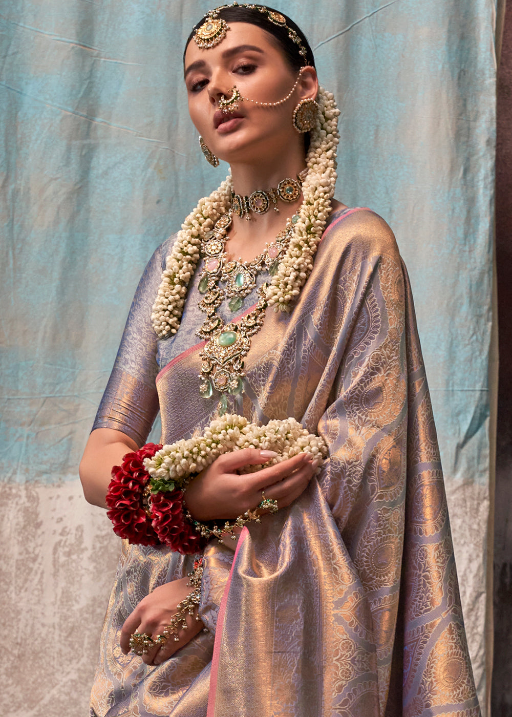 Light Purple Two Tone Kanjivaram Silk Saree Embellished with Intricate Gold Zari work