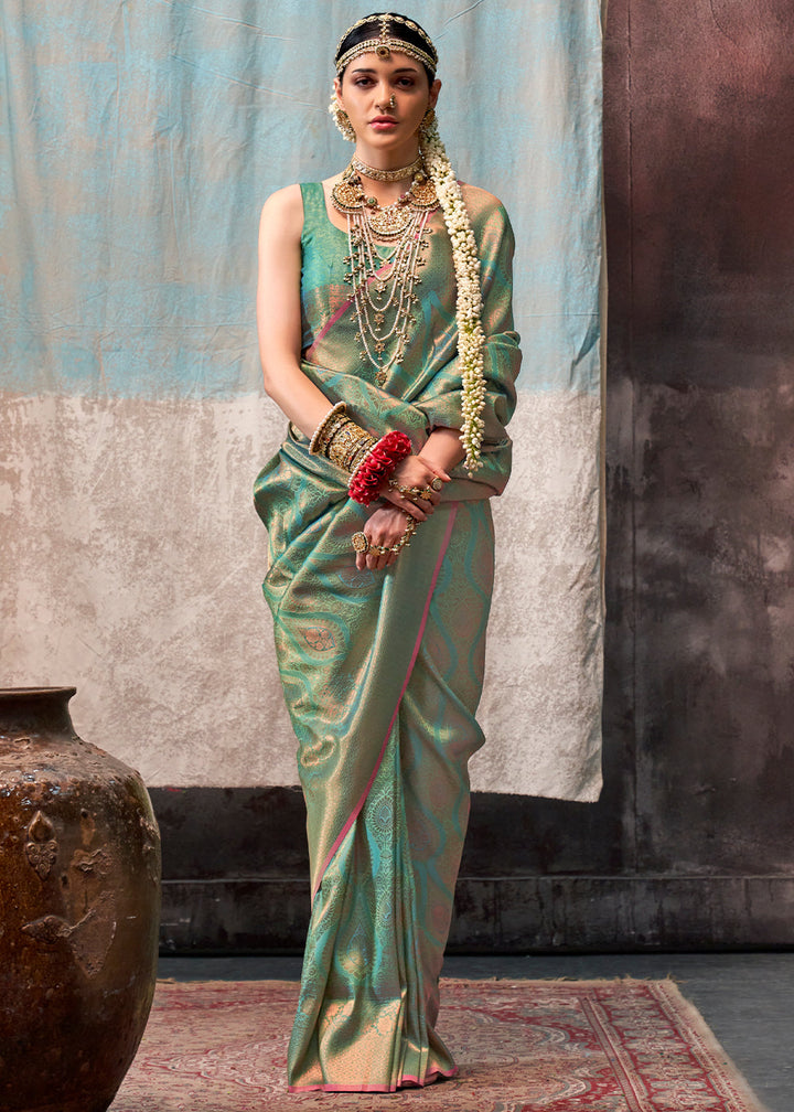 Pastel Green Two Tone Kanjivaram Silk Saree Embellished with Intricate Gold Zari work