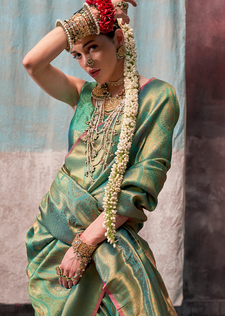 Pastel Green Two Tone Kanjivaram Silk Saree Embellished with Intricate Gold Zari work