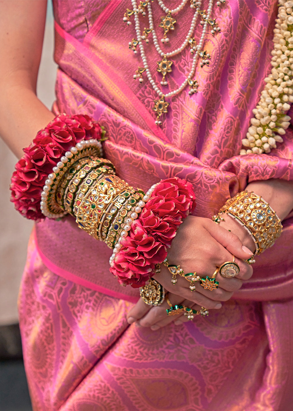 Cream Pink Two Tone Kanjivaram Silk Saree Embellished with Intricate Gold Zari work