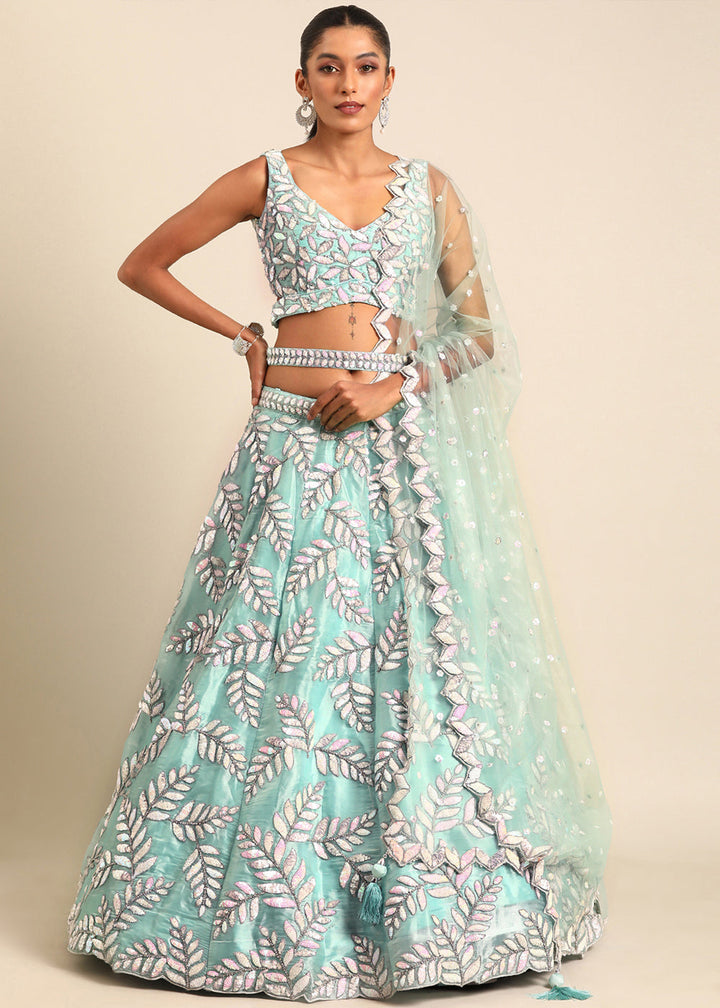 Turquoise Blue Organza Lehenga Choli with Sequins & Zarkan Embroidery work