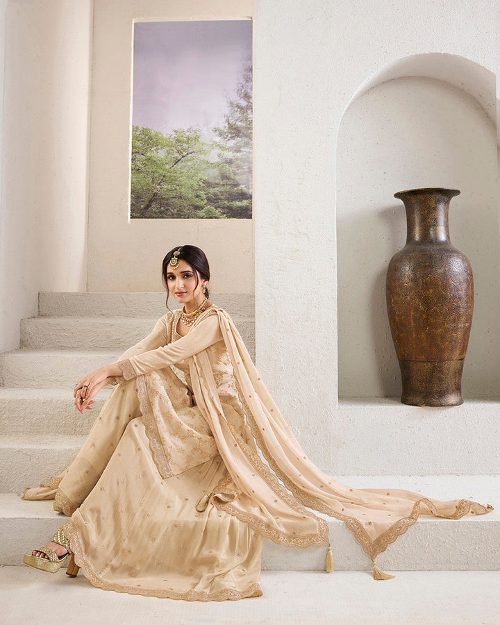 Off-White Chinon Kurta. Paired with Chinon Sharara Bottom and Chinon Dupatta