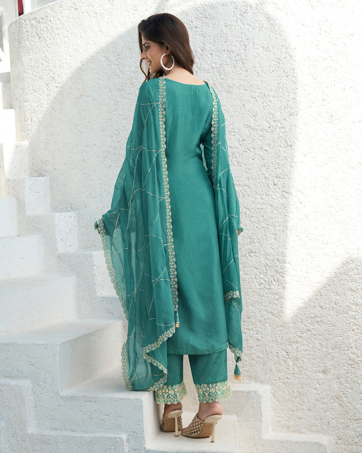 EEmbrace Green Dola Silk Kurta. Paired with Santoon Straight Pants and Organza Dupatta