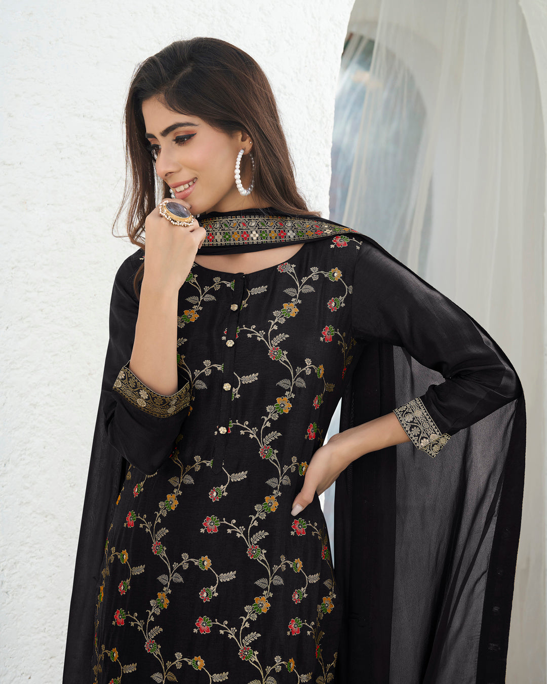 Black Dola Silk Jacquard Kurta . Paired with Santoon Trouser and Chinon Dupatta