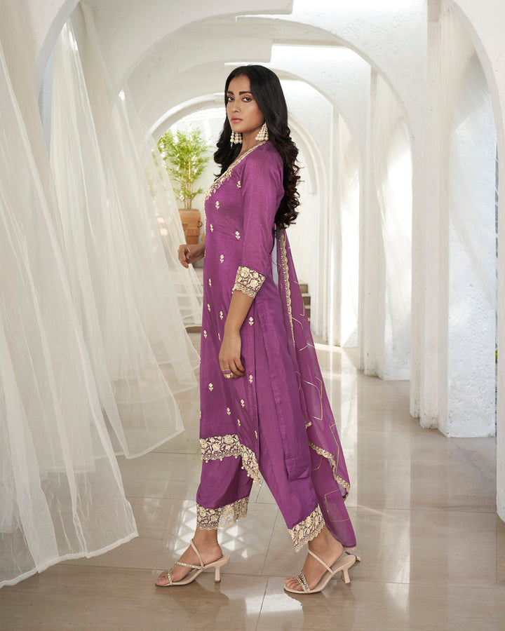 Plum Purple Dola Silk Kurta. Paired with Santoon Straight Pants and Organza Dupatta