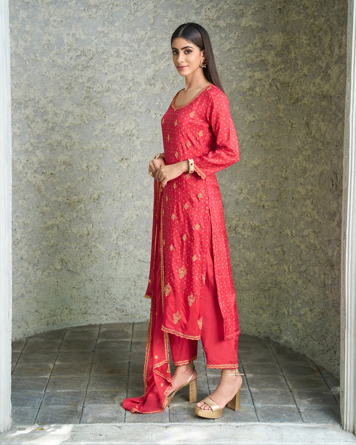 Salsa Red Dola Silk Kurta with Bandhni Print & Zari Work. Paired with Santoon Straight Pants and Chinon Dupatta