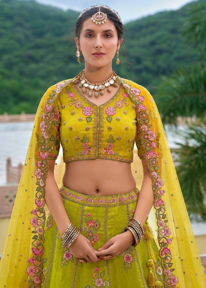 Cadmium Yellow and Green Viscose Tissue Lehenga Choli with Embroidery Work