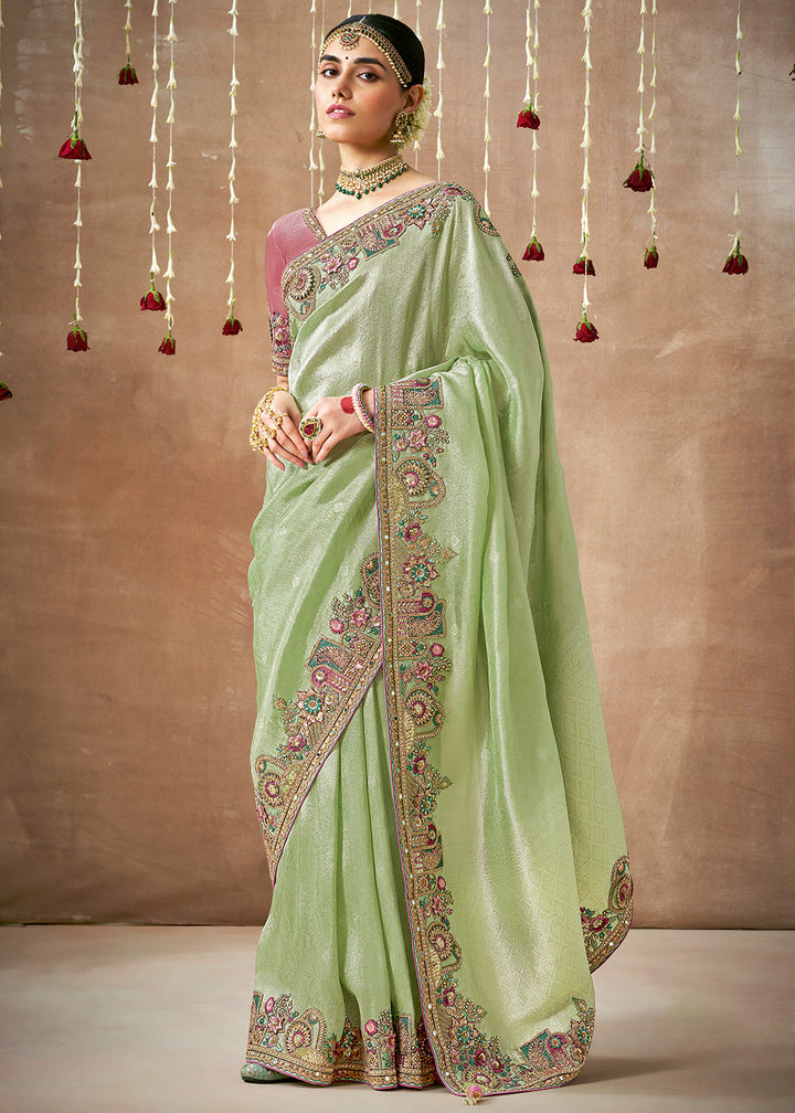 Pastel Green Zari Woven Tissue Dola Silk Saree having Sequence, Pearl, Mirror & Thread Work: Festival Edition