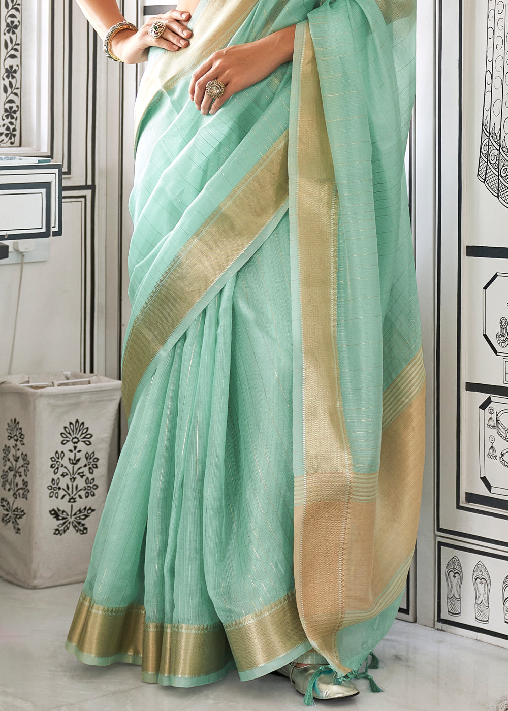 Turquoise Blue Chiffon Saree Having Handloom Weaving Border & All Over Zari Lining