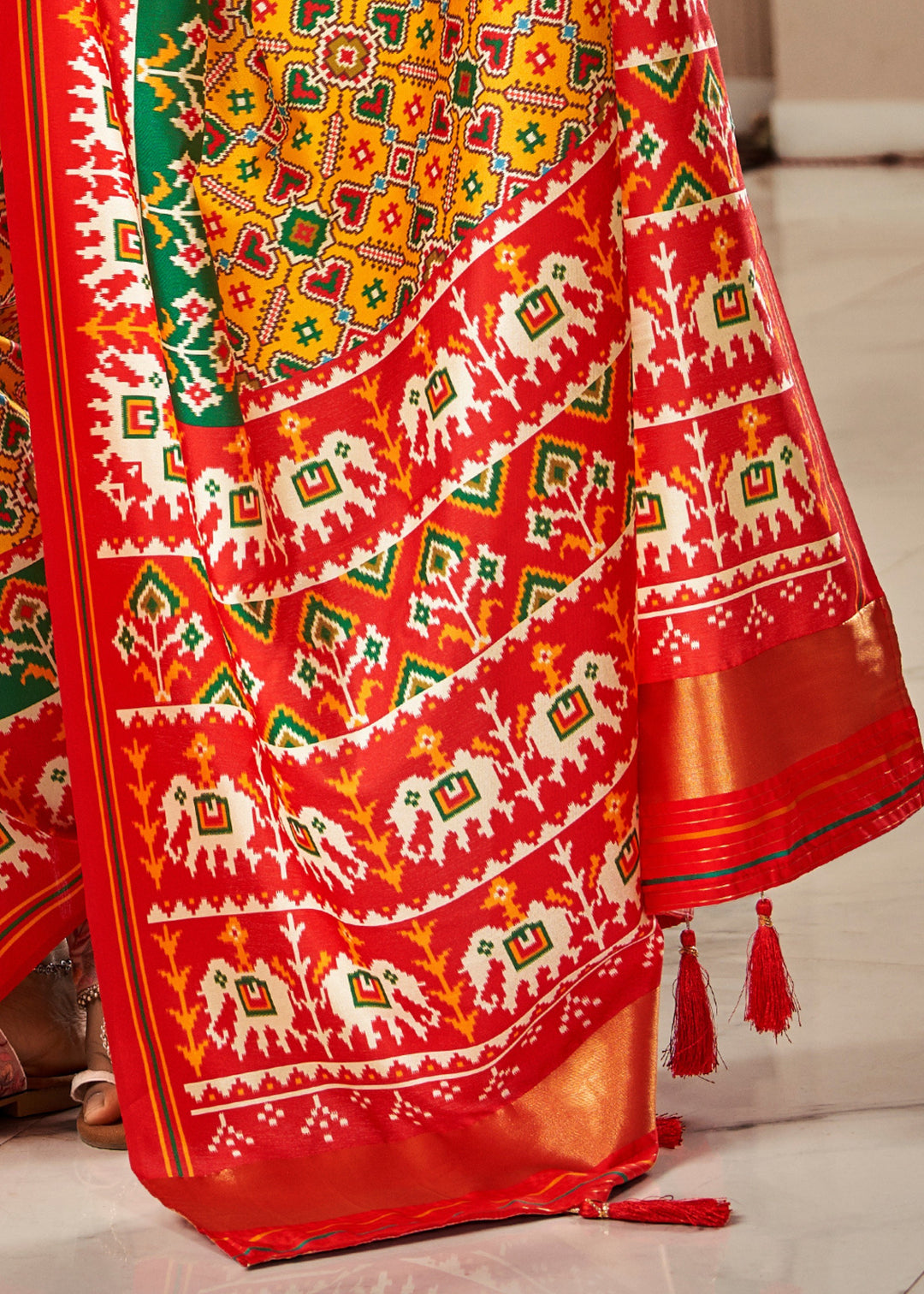 Saffron Yellow Tussar Silk Saree With Beautiful Patola Print