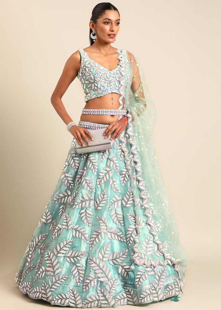 Turquoise Blue Organza Lehenga Choli with Sequins & Zarkan Embroidery work