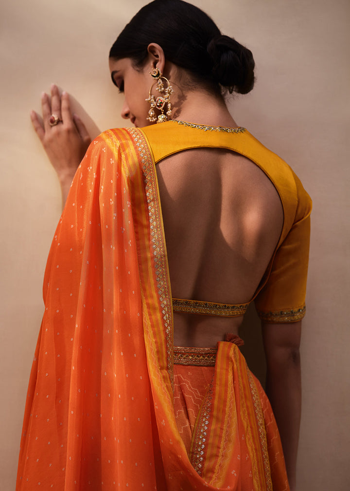 Yellow & Orange Digitally Printed Gaji Silk Lehenga with Borders & Belt Embroidery