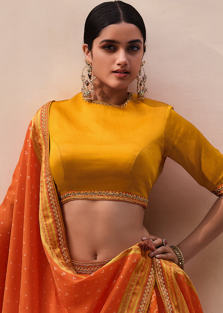 Yellow & Orange Digitally Printed Gaji Silk Lehenga with Borders & Belt Embroidery