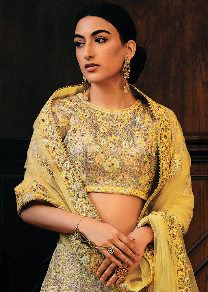 Shades Of Yellow Heavy Embroidered Net Lehenga Choli