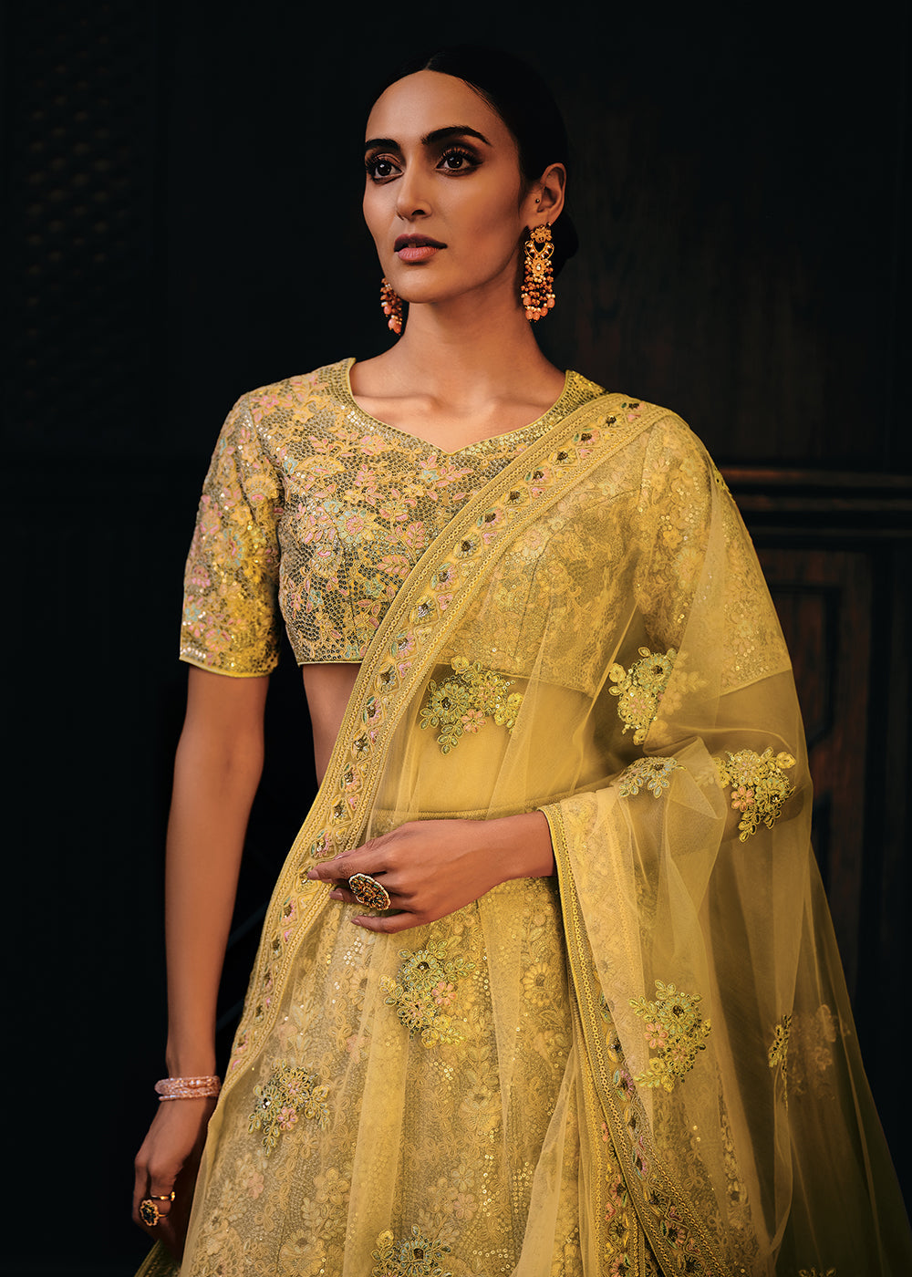 Shades Of Yellow Heavy Embroidered Net Lehenga Choli