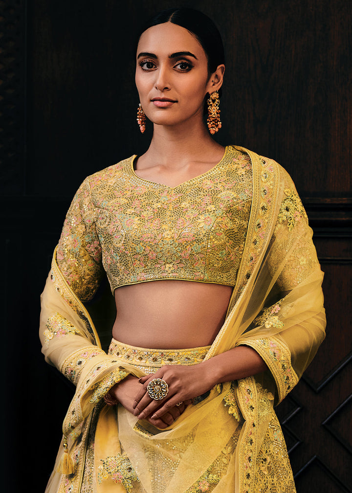 Shades Of Yellow Heavy Embroidered Net Lehenga Choli