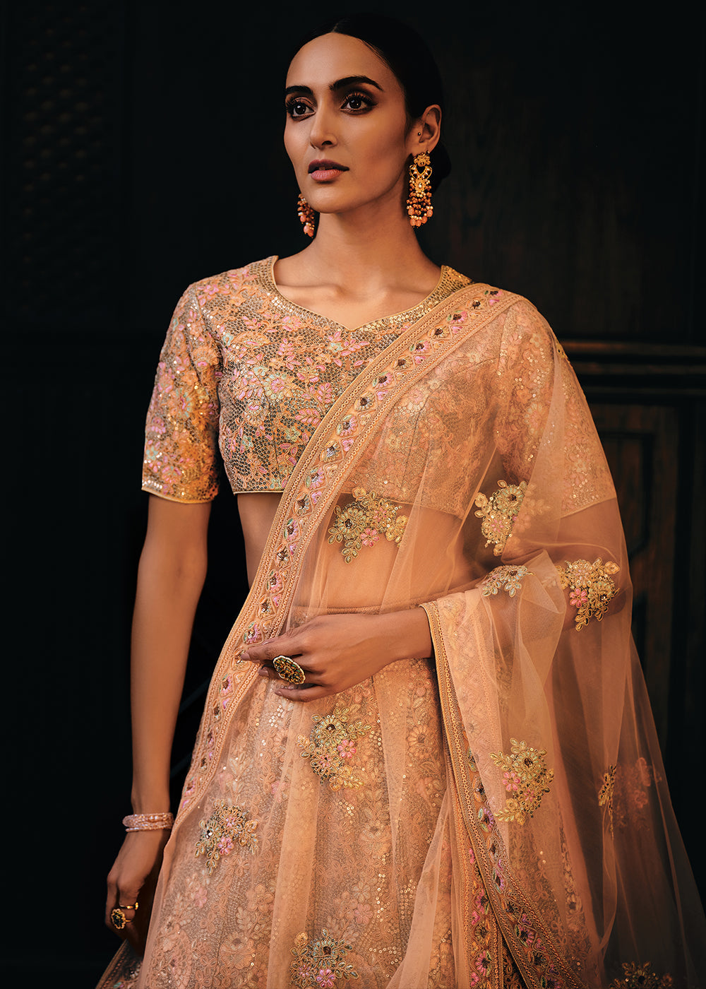 Shades Of Pink & Orange Heavy Embroidered Net Lehenga Choli