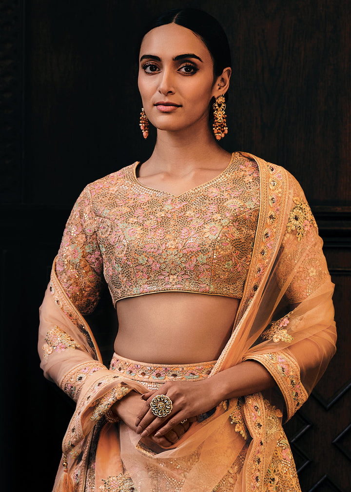 Shades Of Pink & Orange Heavy Embroidered Net Lehenga Choli