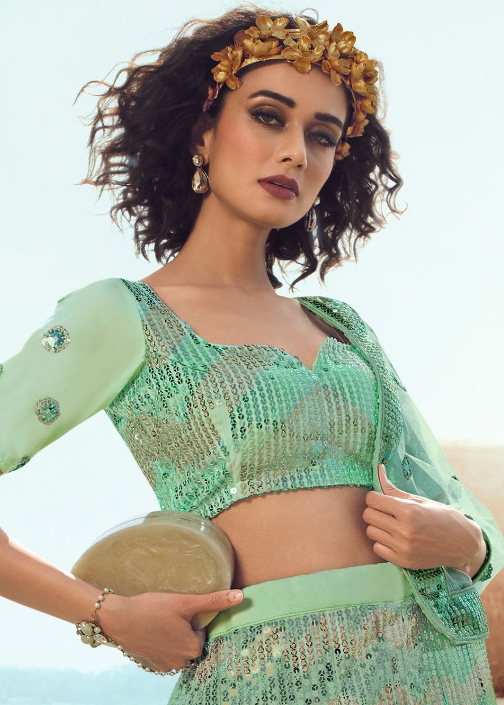 Mint Green Soft Net Designer Lehenga Choli with overall Sequins work